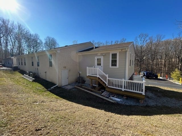 School Building Beside The Trees